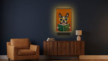 Smart French Bulldog LED canvas glowing on a navy living room wall above a walnut sideboard in the evening